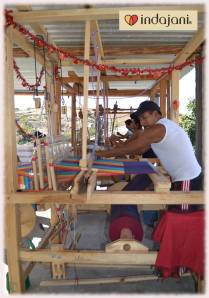 The Uncles busy on a foot pedal loom