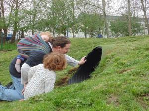 Slingdad Dom at the park with his two kids