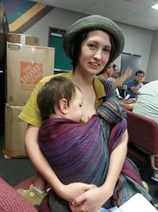 Nursing in a Rebozo carry at a meeting with City Council