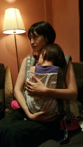 3 year old having a rest on my front in the restaurant 